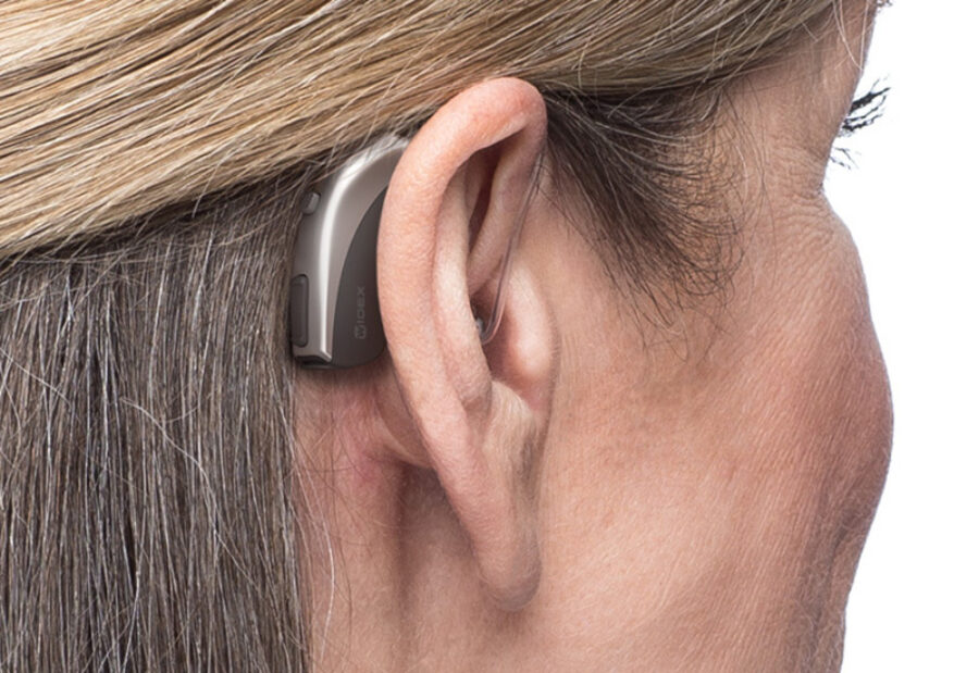 Back view of a BTE (Behind The Ear) hearing aid being worn